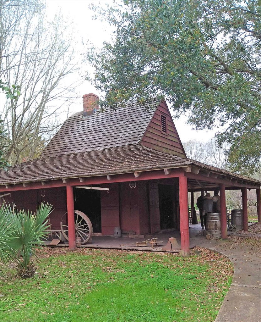 Creole brown wooden house in a wooded area