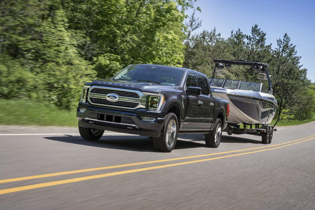 Ford truck pulling boat