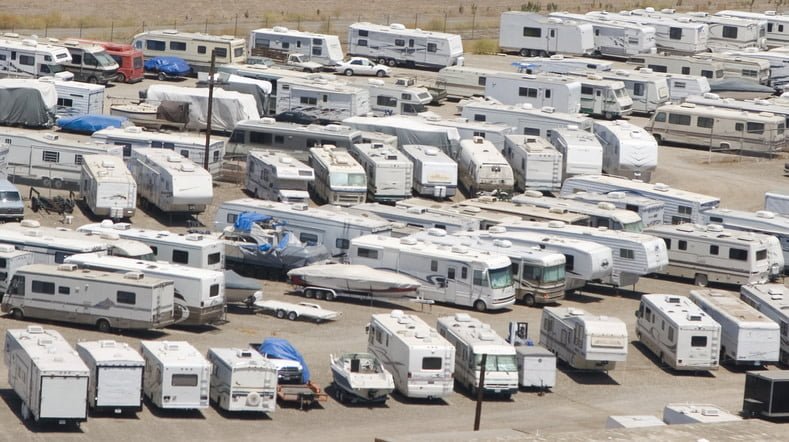 Many trailers being stored on a large lot