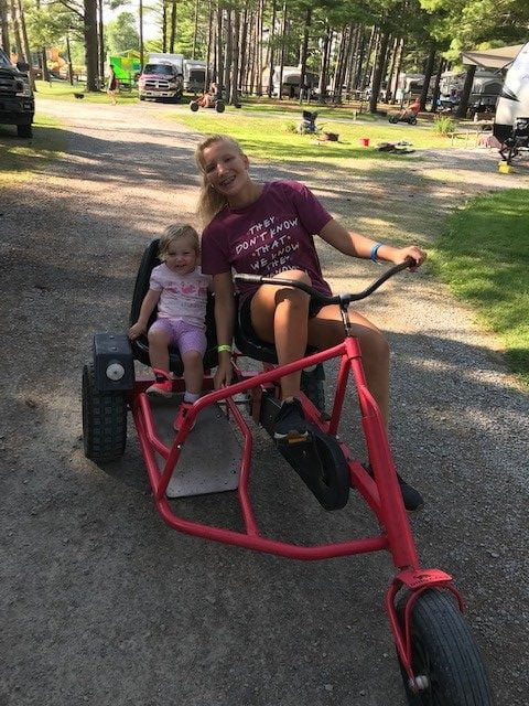 kids riding a double bike