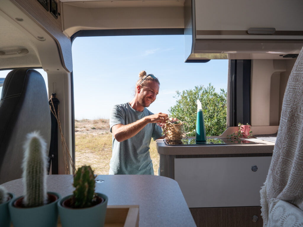 Man looks after cactuses in his van