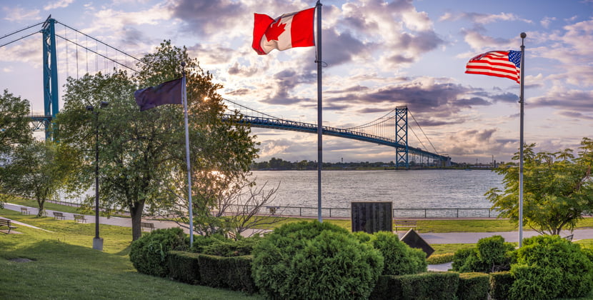 The Ambassador bridge links Detroit, Michigan with Windsor, Ontario. It is one of the busiest trade routes in North America. This photo was taken from Windsor, Ontario, Canada, facing North-West towards Detroit.