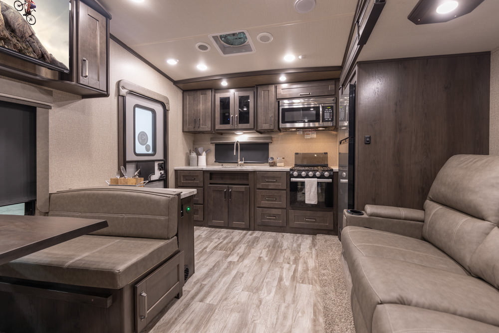 Interior view of the living space within a Grand Design Reflections 150 Series RV.