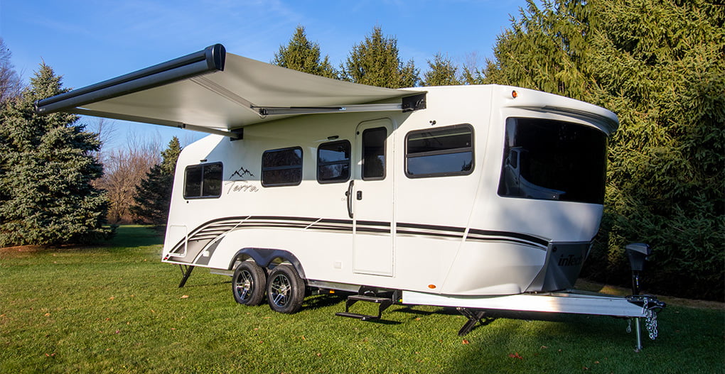 Exterior view of InTech’s Terra Oasis RV with the optional awning. 