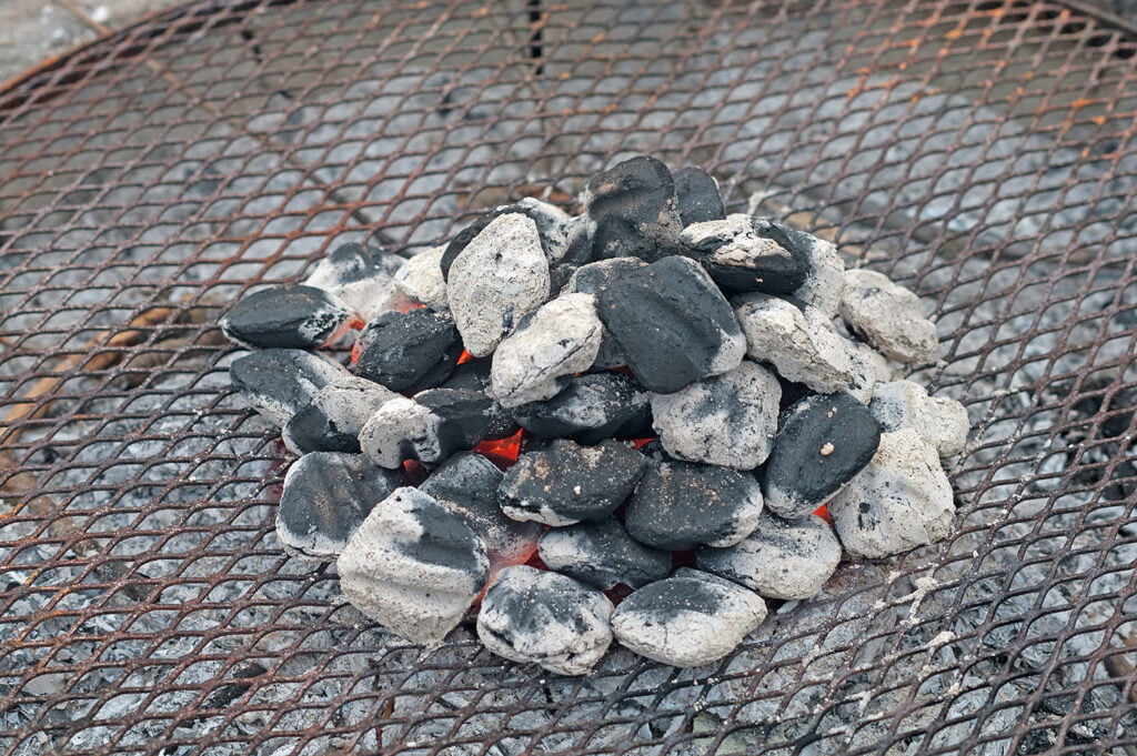 A pile of lit briquets