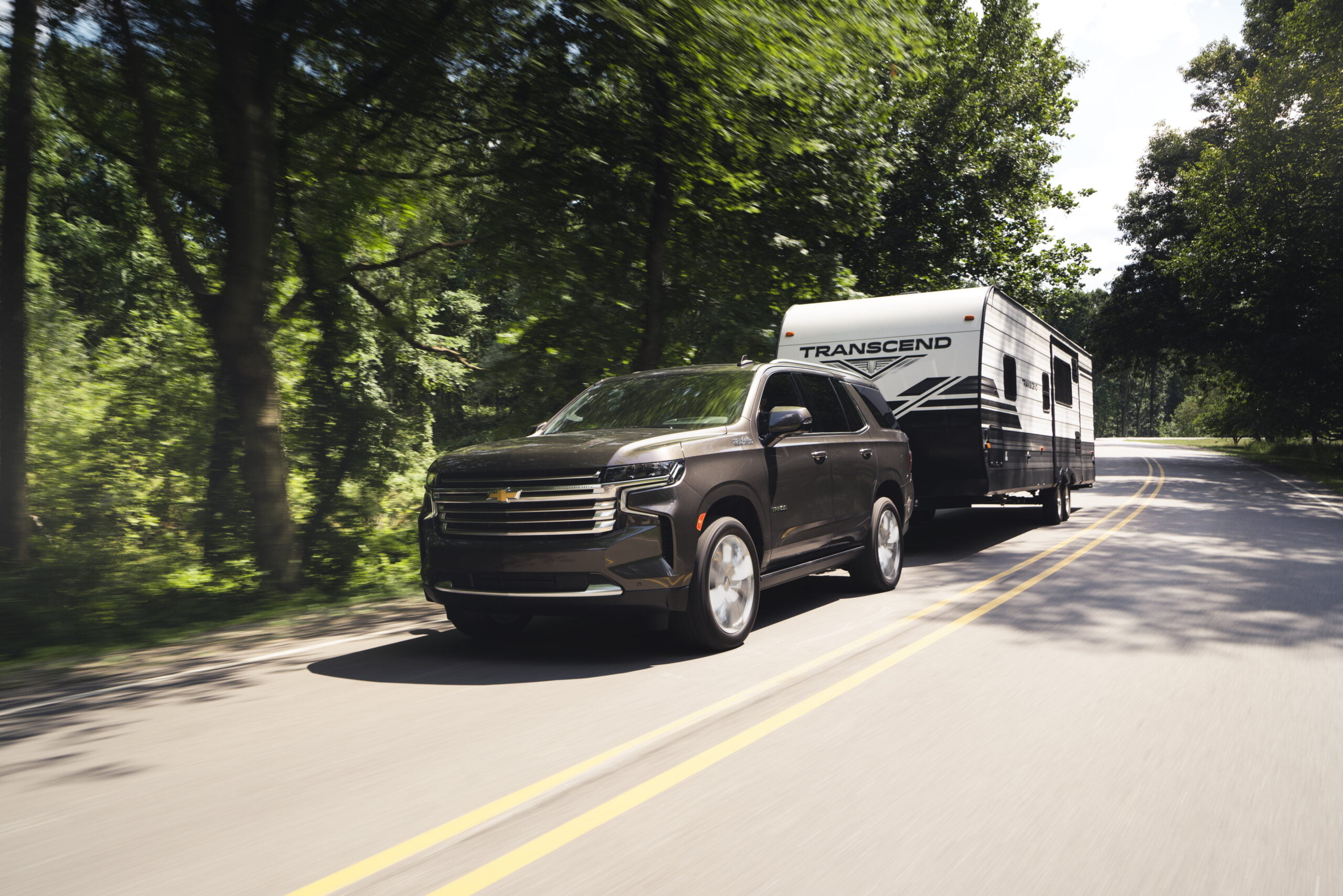 2021 Chevrolet Tahoe SUV towing an RV