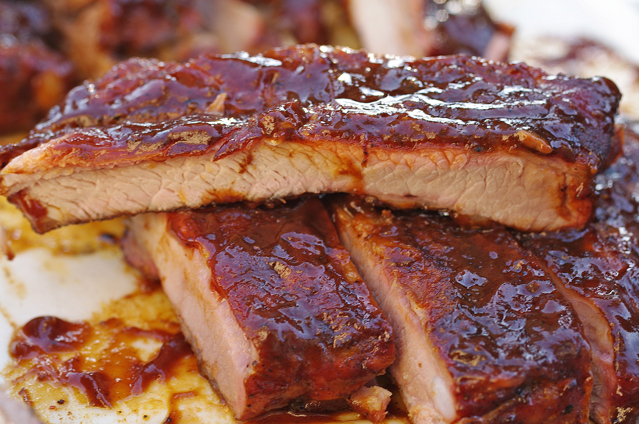 BBQ pork ribs covered in BBQ sauce ready to be enjoyed!