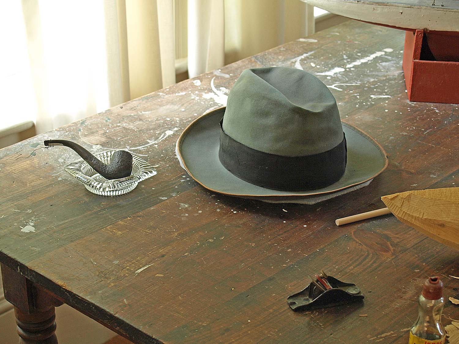 FDR’s hat and pipe on a table in the Roosevelt Cottage on Campobello Island.