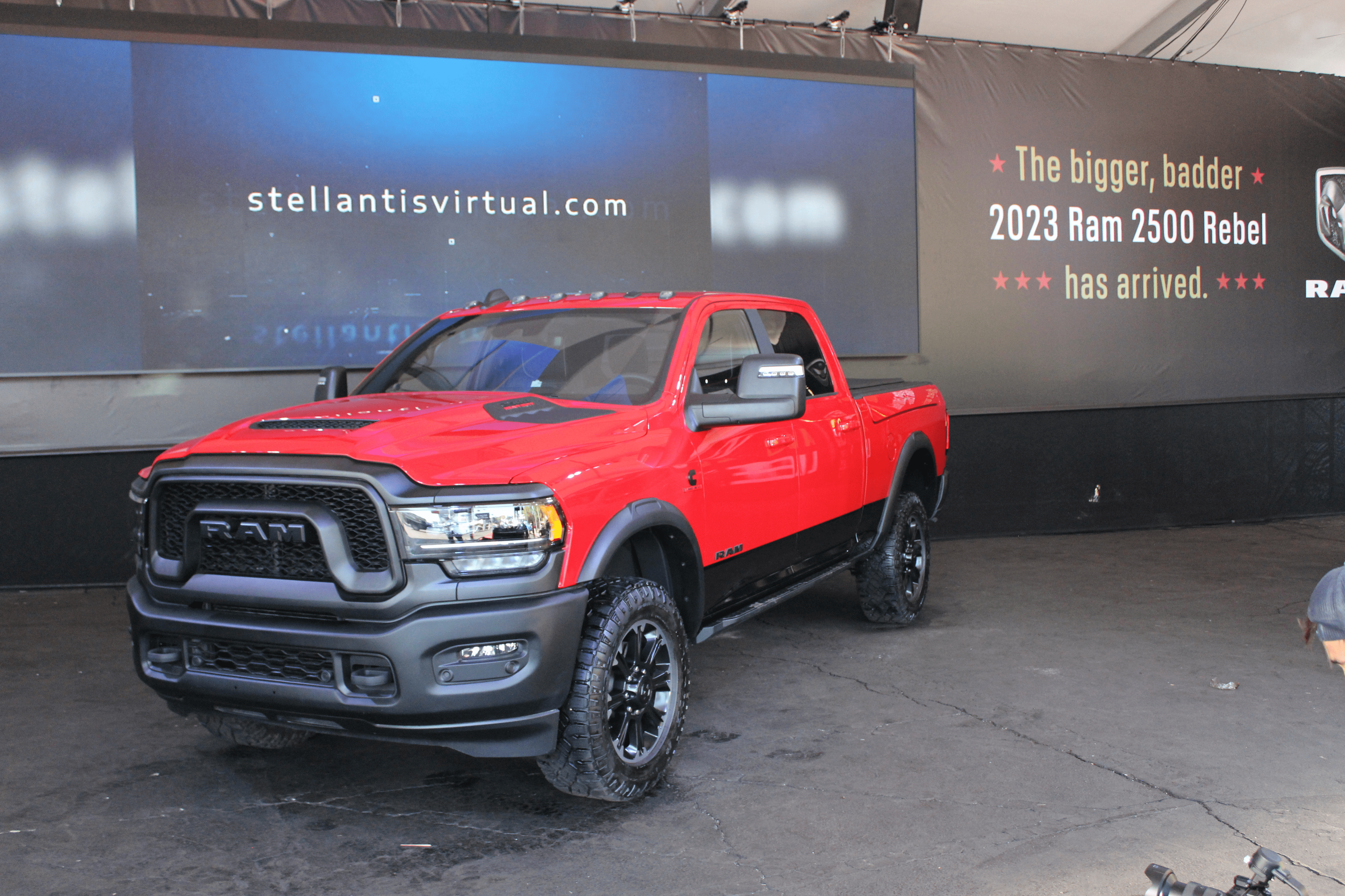 A red 2023 Dodge Ram HD Rebel pick-up truck is showcased at the Texas Auto Show. 