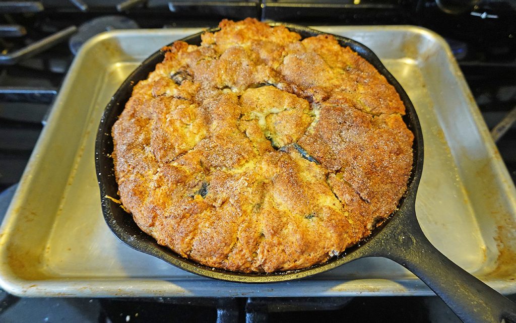 Bake until the top of caramelized and a toothpick poked into the centre of the batter comes out clean.