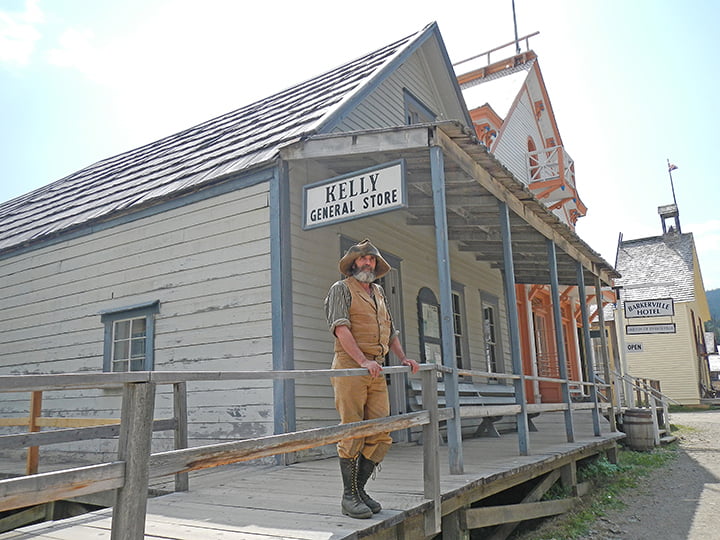 Interpreter dressed in miners working attire from the Gold Rush era at Barkerville Historic Town & Park.