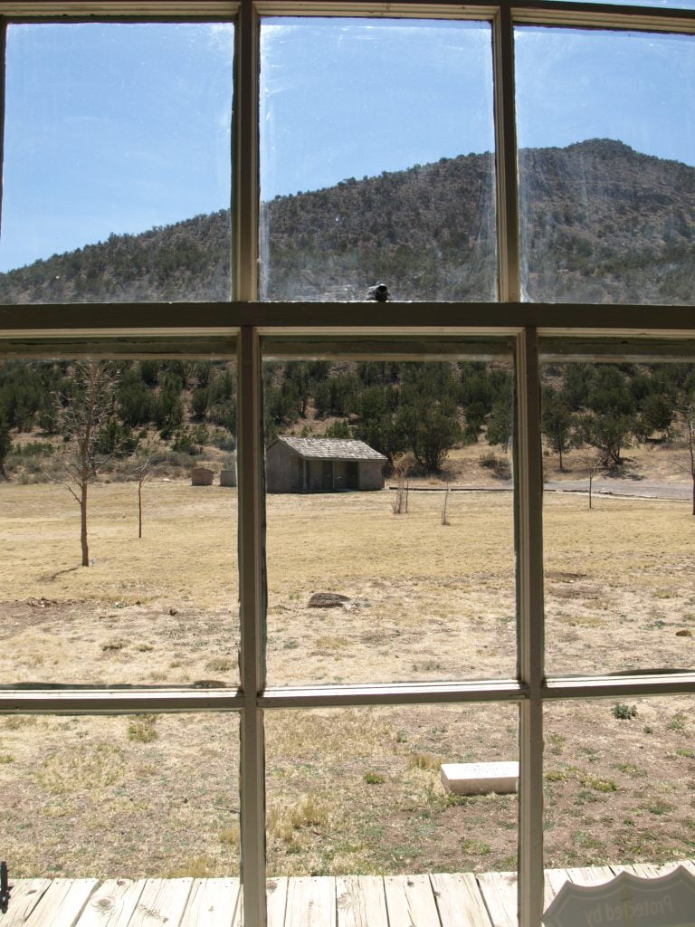 A view of a house through a window.