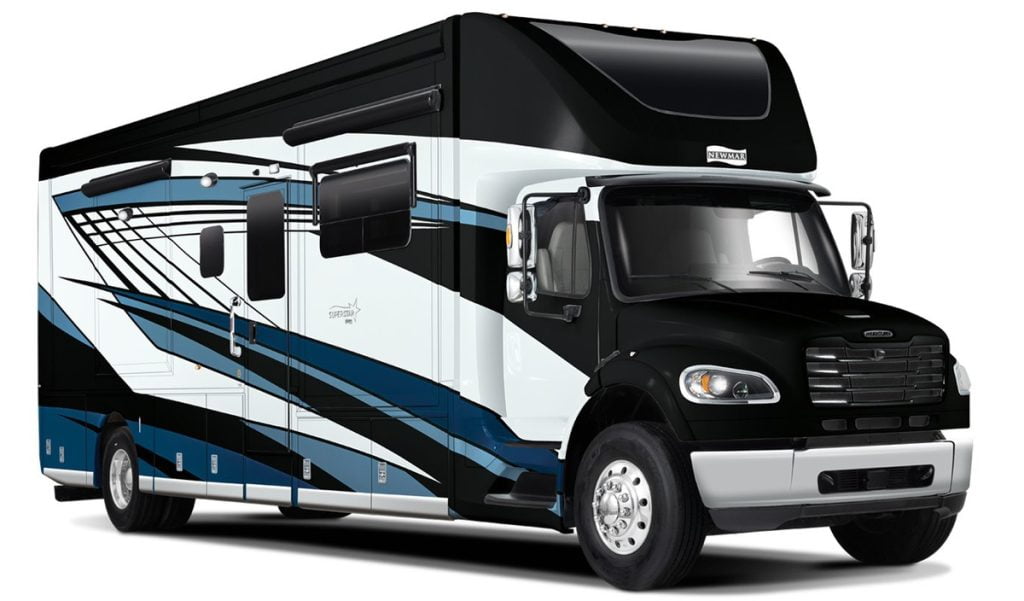 An image of a Newmar Super Star Super C class C motorhome. The front of the motorhome looks similar to a large truck. The stunning blue is wrapped with streaks of white.