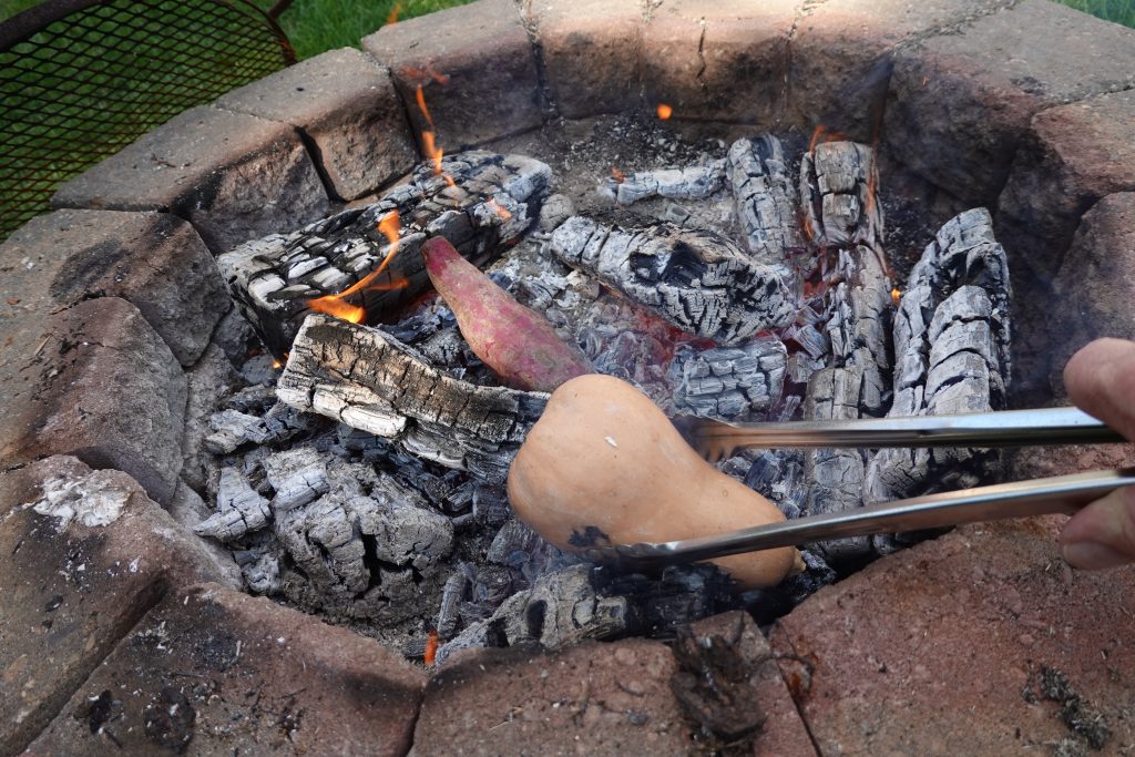 Place vegetable right on the coals.