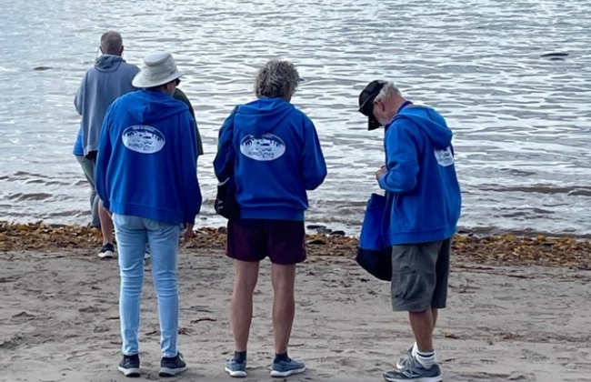 Explorer members by the lake