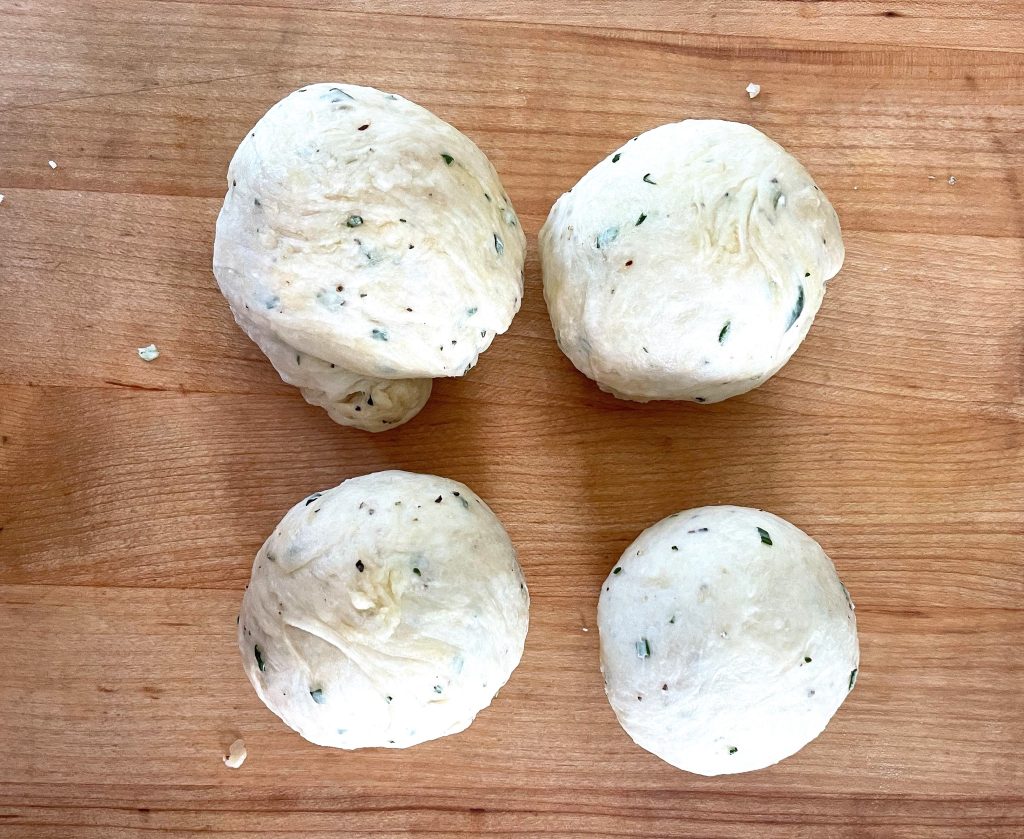 Dough rolled into four even balls.