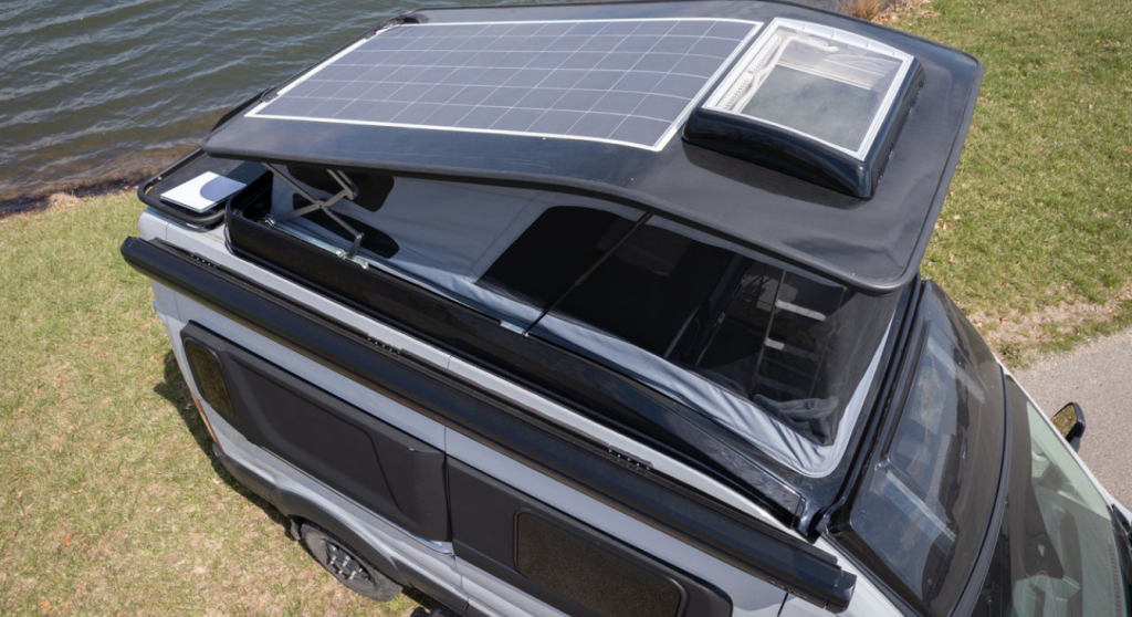 View of the solar panel and the pop-top of the Grand Design Lineage Series VT.