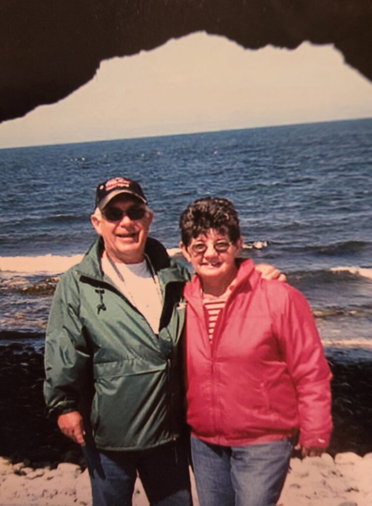 RV Club members posing on a coastal RV trip in Canada.