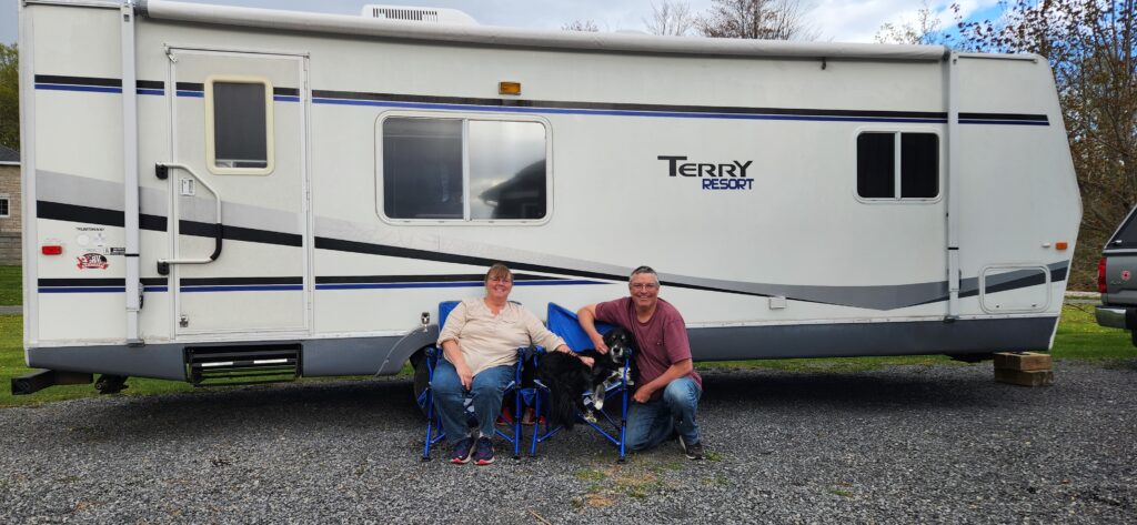 Travel trailer parked at a Canadian campsite