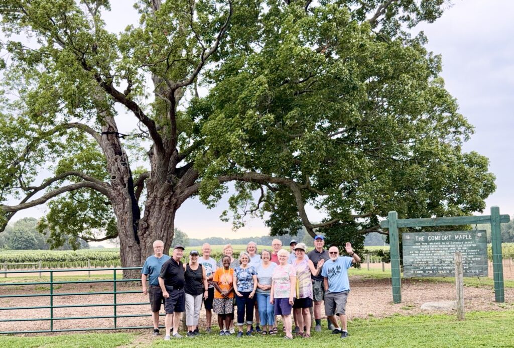 Explorer RV Club members gathered beneath the historic Comfort Maple tree in Pelham, Ontario.