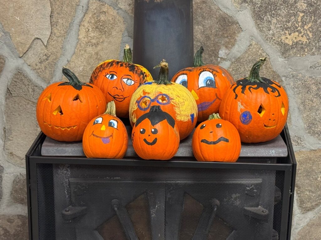 Rally participants display their creativity during the pumpkin-carving activity.